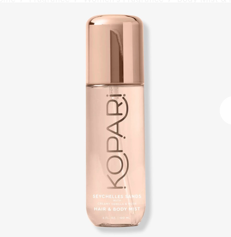 Bruma corporal y capilar Mi tienda Kopari Seychelles Sands con aroma a vainilla y almizcle en envase de oro rosa.